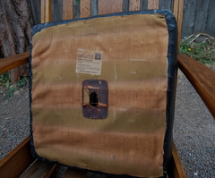 Original "double-deck crucible steel spring floating cushion" bottom covering with the Limbert's paper label with leather care instructions.  